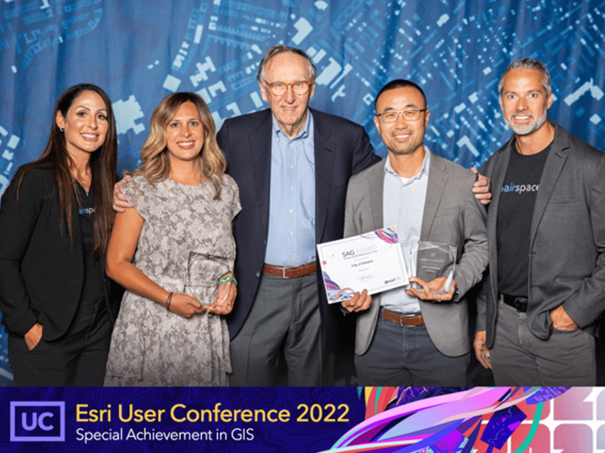 Ontario leaders accept their Esri award for Special Achievement in GIS for Esri UC 2022